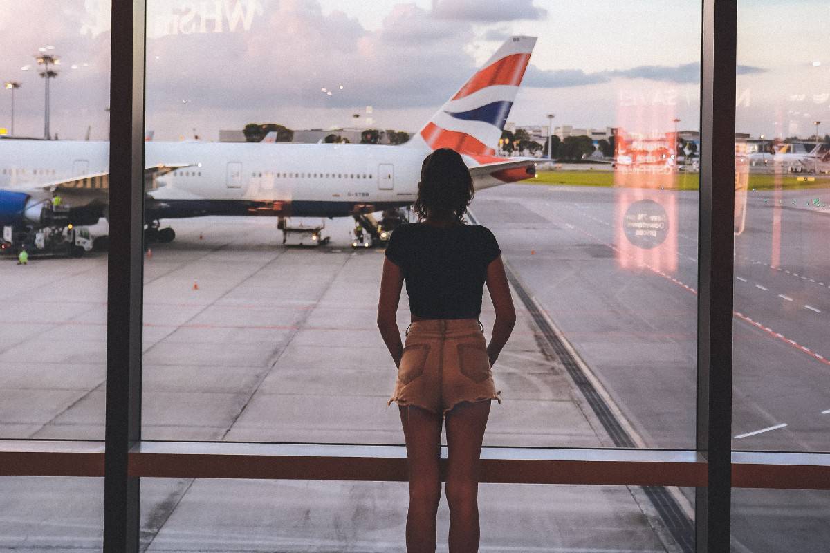 Woman looking at the plane